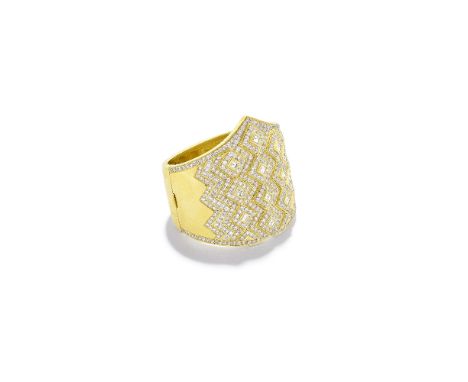 DIAMOND HINGED BANGLEWide tapered cuff, set with brilliant and square-cut diamonds in a chevron design, diamonds approximatel