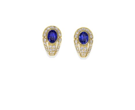 CARTIER: SAPPHIRE AND DIAMOND EARCLIPSEach oval-cut sapphire within a surround of graduated brilliant-cut diamonds,  signed C