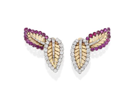 RUBY AND DIAMOND EARCLIPS, CIRCA 1950Each designed as a pair of pierced, polished leaves, with baguette-cut diamond stems, on