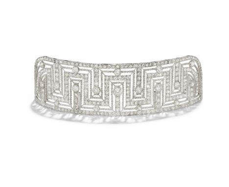 ART DECO DIAMOND BANDEAU, CIRCA 1920Of openwork Greek Key design, set throughout with cushion-shaped, old brilliant and rose-