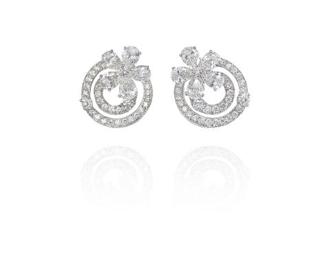 BULGARI: DIAMOND 'FLORA' EARRINGS, CIRCA 2005Each flowerhead set with pear-shaped and brilliant-cut diamonds, issuing a pavé-