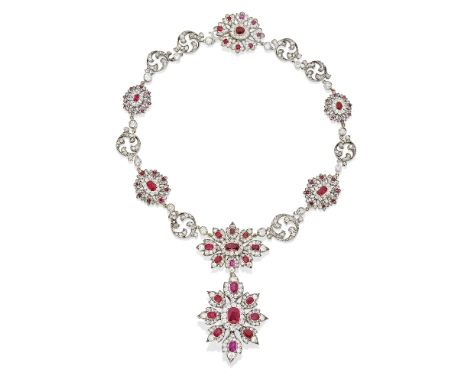 RUBY AND DIAMOND PENDANT NECKLACE, LATE 19TH - EARLY 20TH CENTURYDesigned as a chain of cushion-shaped ruby and old brilliant