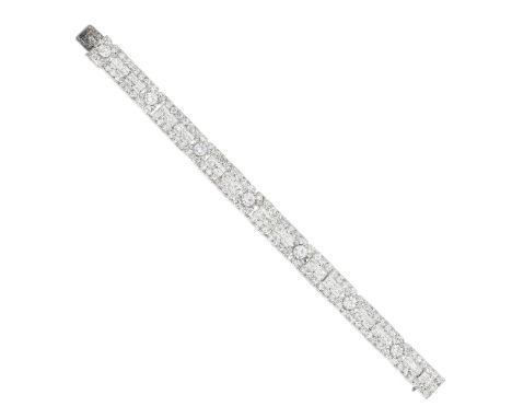 ROOD: ART DECO DIAMOND BRACELET, CIRCA 1930The articulating links set with brilliant, old brilliant and step-cut diamonds, ac