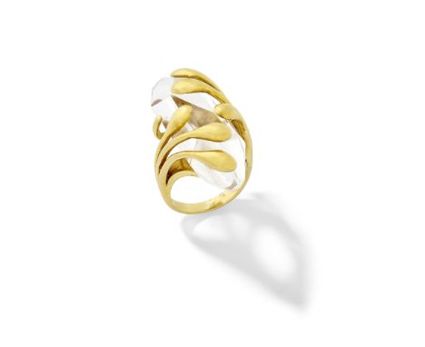 LALAOUNIS: ROCK CRYSTAL 'BIOSYMBOL' RING, CIRCA 1970The fancy-cut rock crystal, enveloped by polished drop motifs,  maker's m