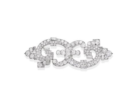 CARTIER: ART DECO DIAMOND BROOCH, CIRCA 1930The arching row of cushion-shaped diamonds within an old brilliant and single-cut
