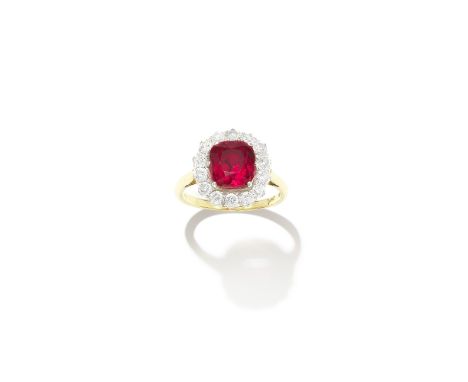 SPINEL AND DIAMOND CLUSTER RINGThe cushion-shaped red spinel, weighing 2.60 carats, within a brilliant-cut diamond surround, 
