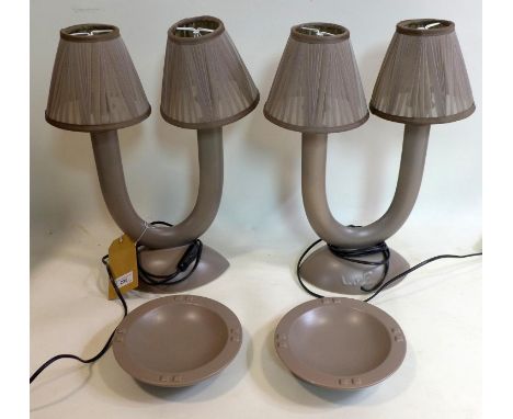 A pair of ceramic table lamps with matching bowls with labels for masse fourmaintraux 