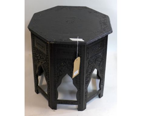 A black painted Moroccan lamp table, H.50 W.50 D.50cm 