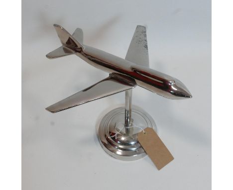 A vintage chrome model of a jet plane, H.39 W.44 D.40cm 
