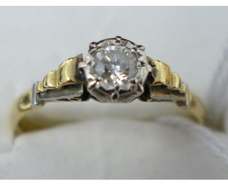 An 18ct gold and platinum diamond solitaire ring 