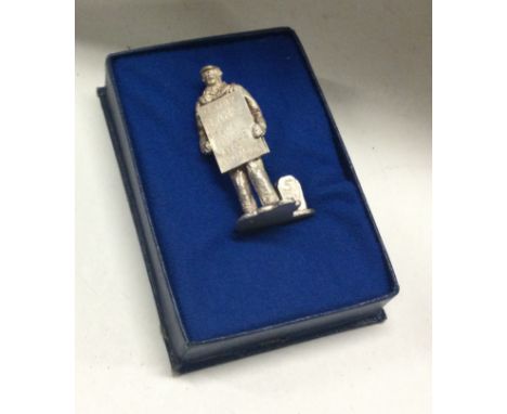 A silver 'Drury Lane' figure in case. Approx. 15 grams. Est. £40 - £60.
