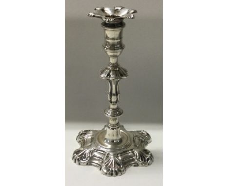 An 18th Century silver taper stick. London 1748. Approx. 186 grams. Est. £400 - £600.