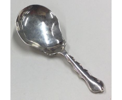 A George III silver caddy spoon with bright cut decoration. Birmingham 1824. By John Bettridge. Approx. 16 grams. Est. £50 - 