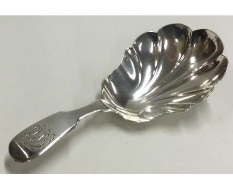 EXETER: A William IV silver caddy spoon with fluted bowl. 1835. By Robert Williams. Approx. 14 grams. Est. £50 - £80.