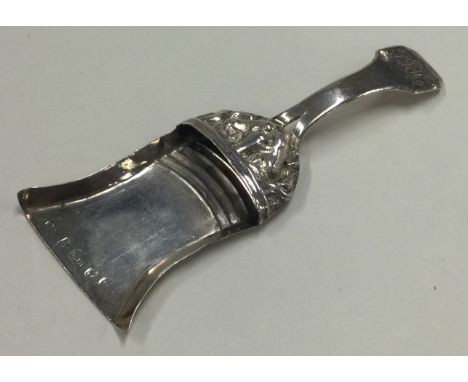 A George III silver figural caddy spoon in the form of a shovel. Birmingham 1806. Approx. 7 grams. Est. £60 - £80.