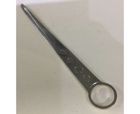A heavy tapering silver meat skewer with ring clasp. Approx. 41 grams. Est. £20 - £30.