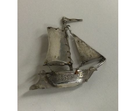 A novelty Dutch silver model of a boat. Approx. 10 grams. Est. £20 - £30.