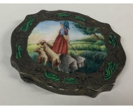 A large silver and enamelled compact depicting a scene of a girl with lambs. Approx. 99 grams. Est. £200 - £300.