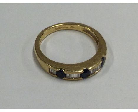 A good sapphire and diamond half eternity ring in 18 carat gold rubover mount. Approx. 4 grams. Est. £250 - £300.