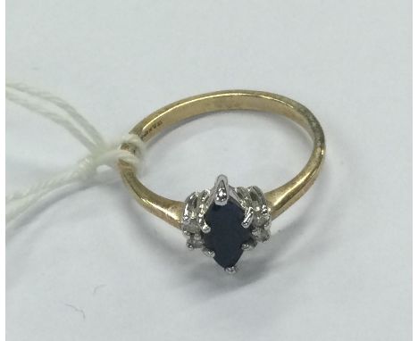 A good diamond and sapphire five stone ring in 9 carat mount. Approx. 2 grams. Est. £40 - £60.