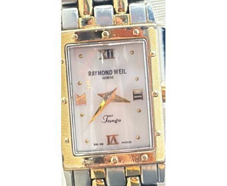 Raymond Weil watch features a two-tone stainless steel and gold bracelet and a rectangular white dial with Roman numerals, bo