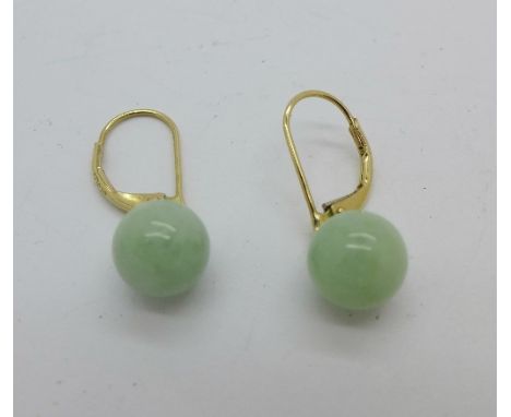 A pair of 9ct gold and jade earrings