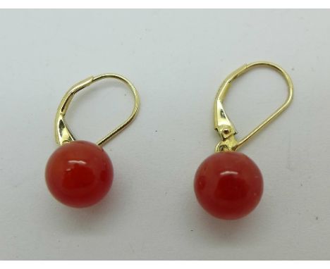 A pair of 9ct gold and red jade earrings