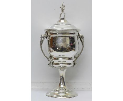 A large silver sporting trophy, Birmingham 1928, 45cm height x 22.5cm width, 1358g, finial shows a realistically modelled cri