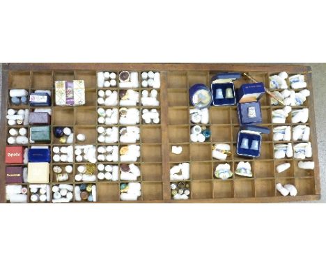 A collection of approximately 100 thimbles, including Worcester, Derby, Limoges, Wedgwood Jasperware and twelve place setting