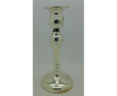 A silver candlestick, Birmingham 1938, weighted base, 17.5cm