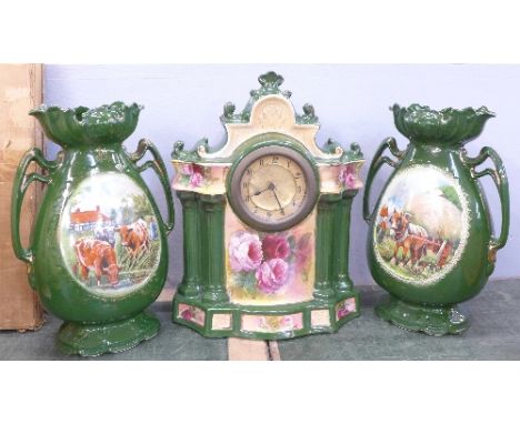 A ceramic clock garniture, one garniture restored