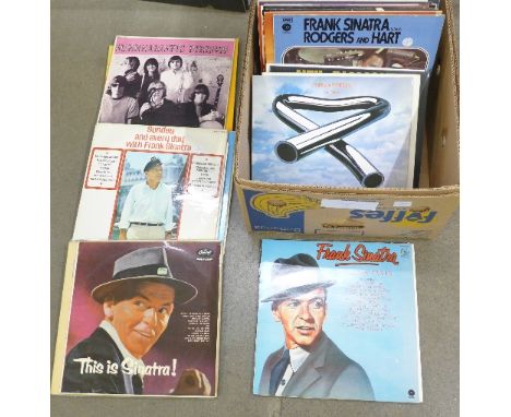 A box of LP records, Sky, Dire Straits, Bob Dylan, Frank Sinatra, Dean Martin, Jefferson Airplane, jazz, etc.