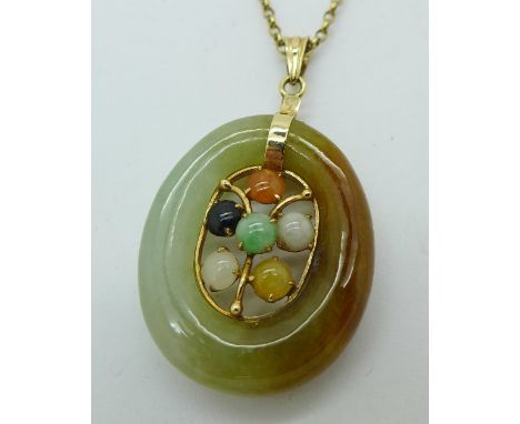 A 14ct yellow gold and multi-colour jade pendant on 9ct gold chain, 10.6g