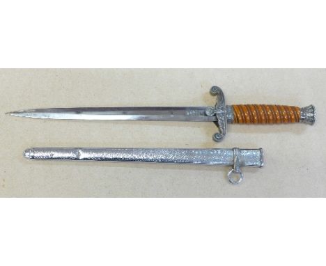 A German army dress dagger made by Carl Eickhorn, Solingen, 1935 model, missing one carrying band
