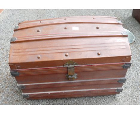 Early 20th Century tin dome topped travel trunk with brass locks 