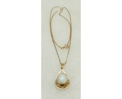 9ct ladies pendant and necklace, the ornate pendant set with opal stone, 4.5 grams