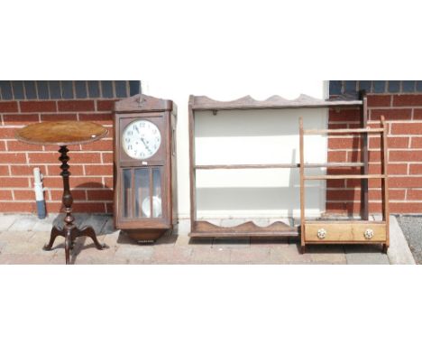 A selection of items to include 2 oak shelving units, an art deco wall clock and a period tripod table (4). 