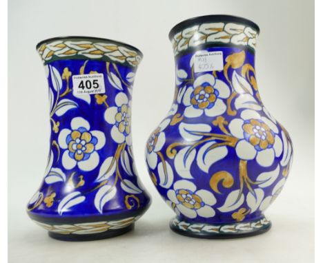 Wardle 1920s vases decorated with stylised blue and white flowers height 29cm and similar smaller vase (possibly by Charlotte