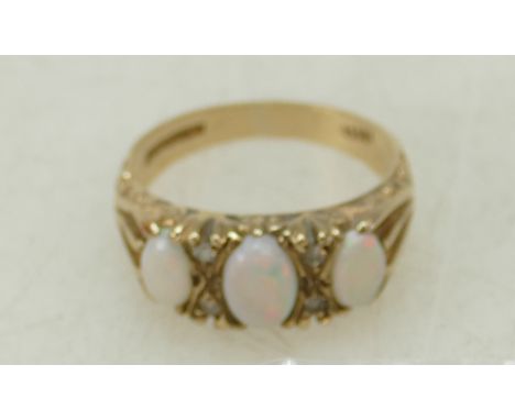 9ct ladies ring set with three opal stones, size M, 3.4 grams