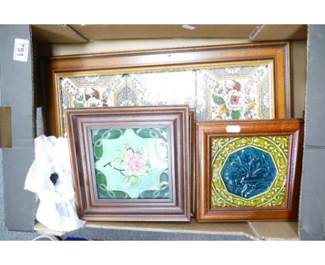 A collection of framed tiles including a triple tile panel and four single vintage tiles, all in wood frames (5)