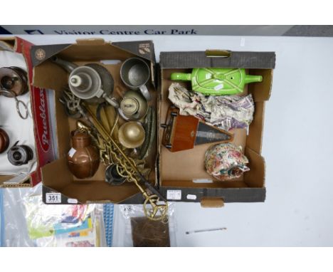 Two trays containing pewter, copper, brass & other metal items, together with novelty carriage tea pot, metronome & unusual n