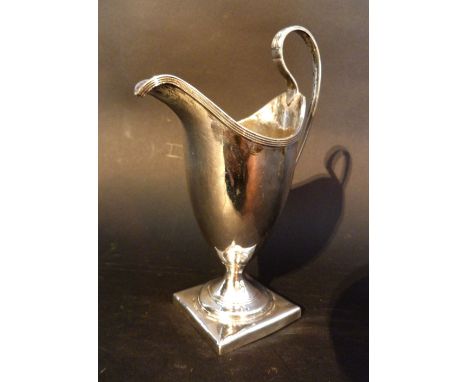 A George III Silver Helmet Shaped Cream Jug by Peter and Ann Bateman, London 1791