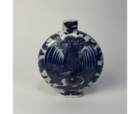 A doucai porcelain moonflask vaseChina, Ming Dynasty (1368 - 1644), 17th centuryfinely decorated with cranes among clouds pai