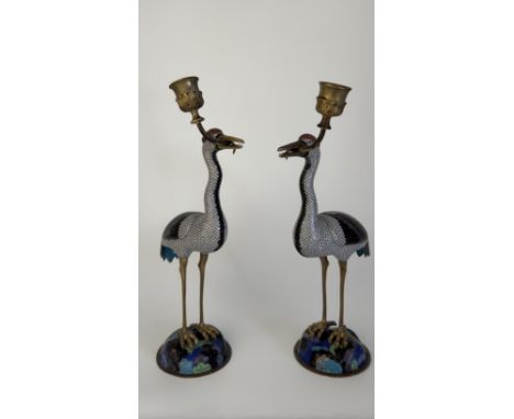 A pair of cloisonne enamel cranes candlesticksChina, Qing Dynasty (1644 - 1912), Guangxu (1875 - 1908)with later made europea