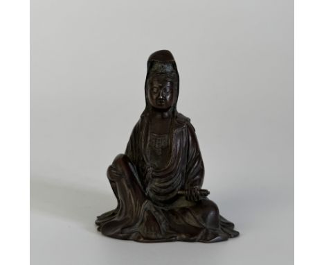 A cast bronze and patinated seated guanyinChina, Qing Dynasty (1644 - 1912), Qianlong (1735 - 1796)Provenance: French private