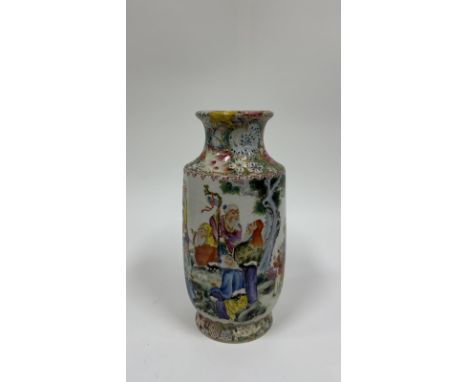 A famille rose "rouleau" porcelain vaseChina, Republic Periodfinely decorated in overglaze famille rose enamel with scene of 