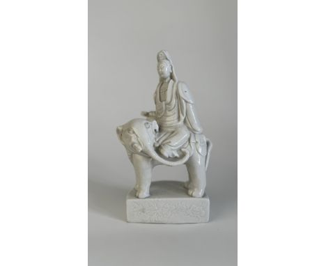 A blanc de chine porcelain model of Guanyin seated on the back of an elephantChina, Qing Dynasty (1644 - 1912)The Immortal we