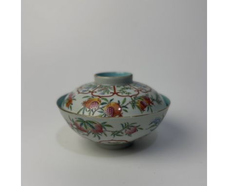 A famille rose porcelain "Sanduo" bol and coverChina, Qing Dynasty (1644 - 1912), Jiaqing (1796 - 1820)The bowl is finely dec