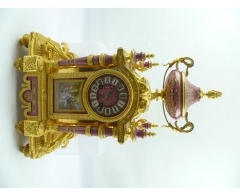 LE ROY ET FILS A LATE 19TH/EARLY 20TH CENTURY FRENCH GILT BRASS MANTEL CLOCK, having puce porcelain urn finial and front colu