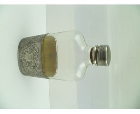 A VICTORIAN HIP FLASK, the plain glass body fitted screw cap, the plated removable base doubles as a drinking cup with gilded